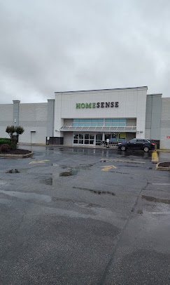 HomeSense storefront after Zenith completed TPO and metal roofing work