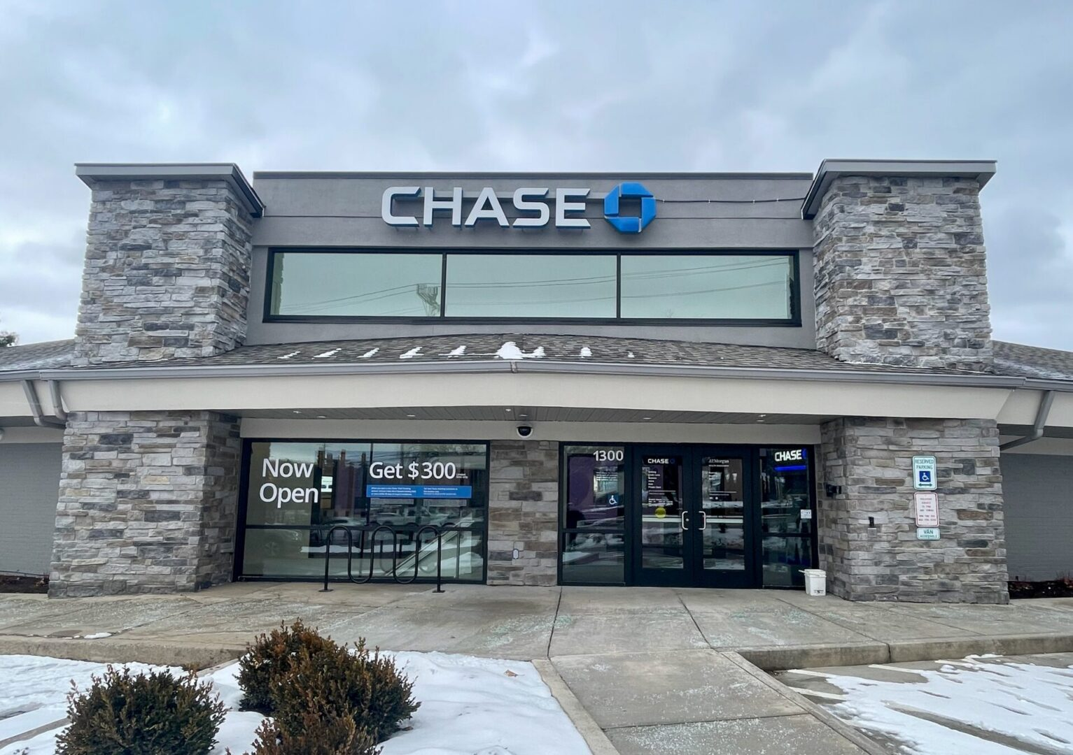 Completed Chase Bank branch with new shingle mansard roof and soffit work by Zenith