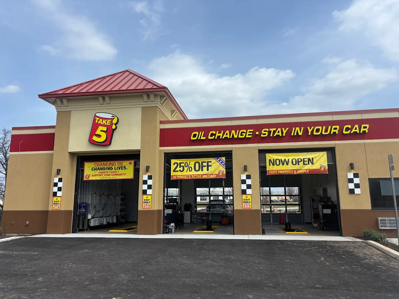 Completed Take 5 Oil Change building with new standing-seam metal roofing by Zenith