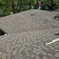 New architectural shingle roofing installed on the Chase Bank branch mansard