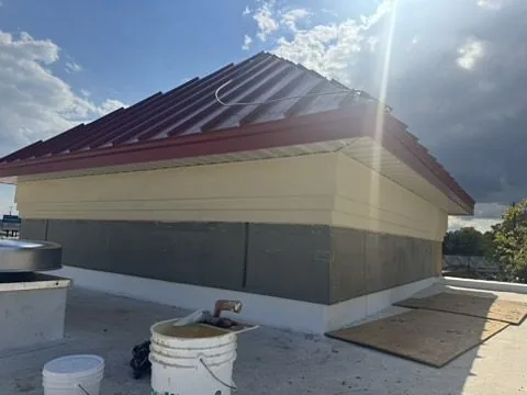 Metal roofing detail on the Take 5 Oil Change commercial building